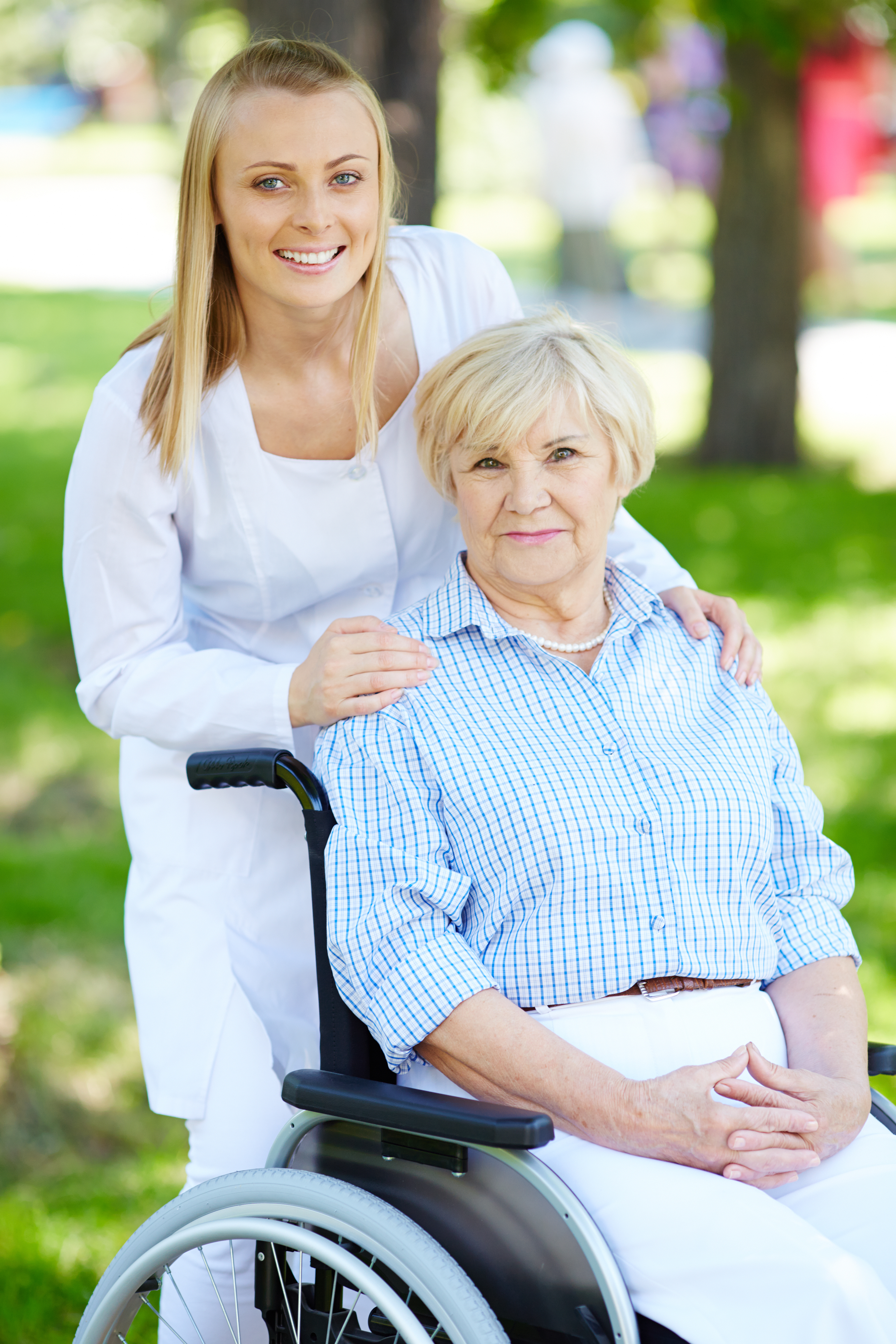 Caregiver sharing a warm moment with an older client at home